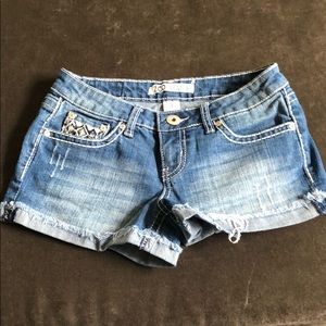 ZCO bedazzled shorts.